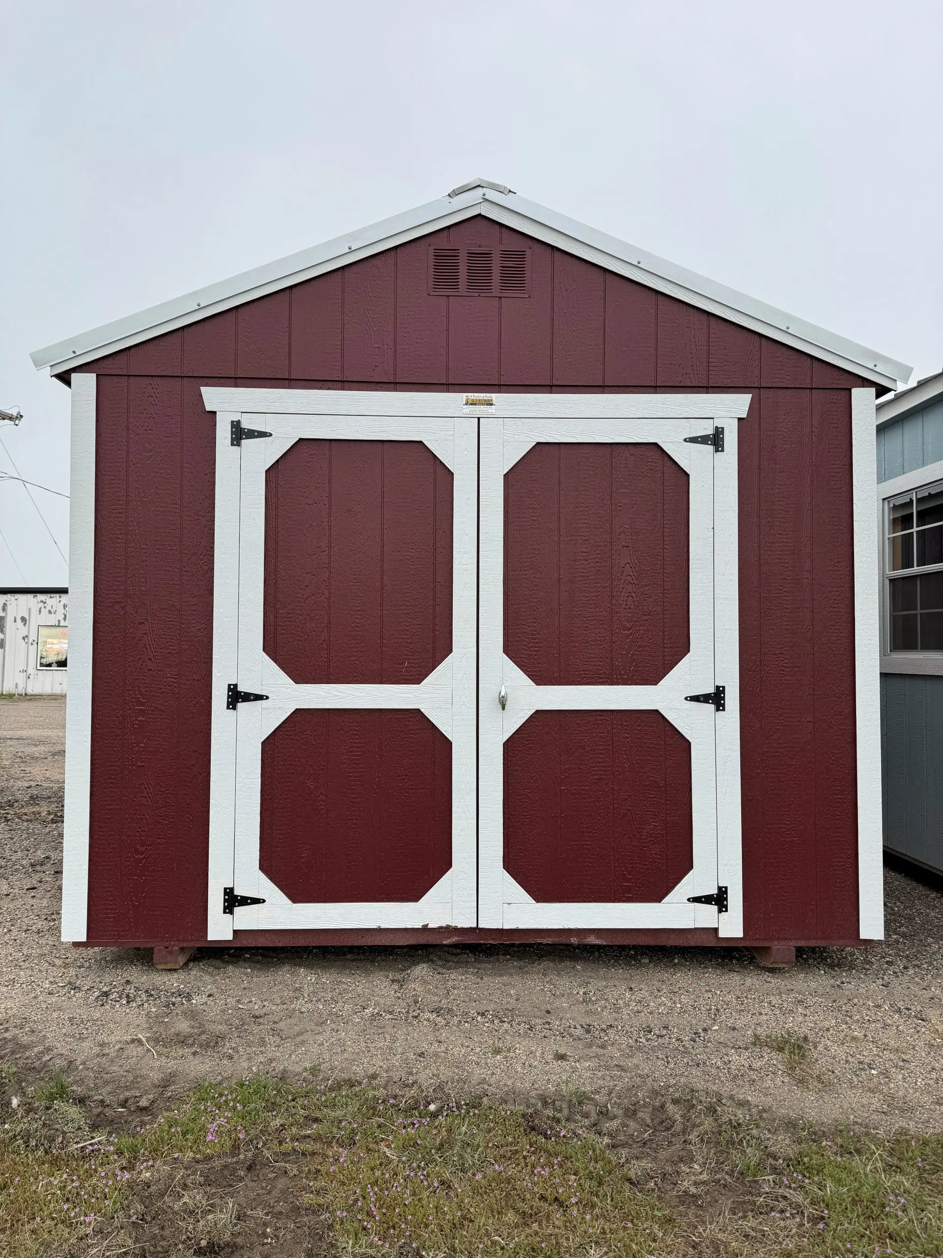 For Sale 10×12 Utility Shed Pinnacle Red Paint Barn White Trim at French Creek Design Shed Sales in Casper, WY