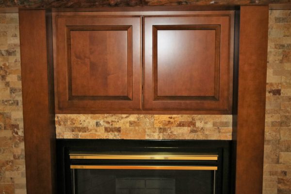 Stacked Stone Fireplace with Cherry Wood Mantel