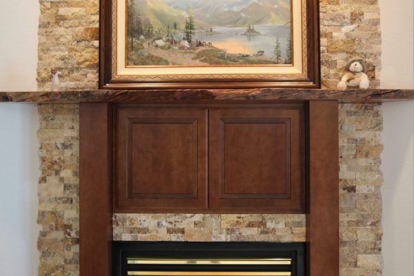 Stacked Stone Fireplace with Cherry Wood Mantel