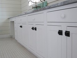 laundry room painted cabinets