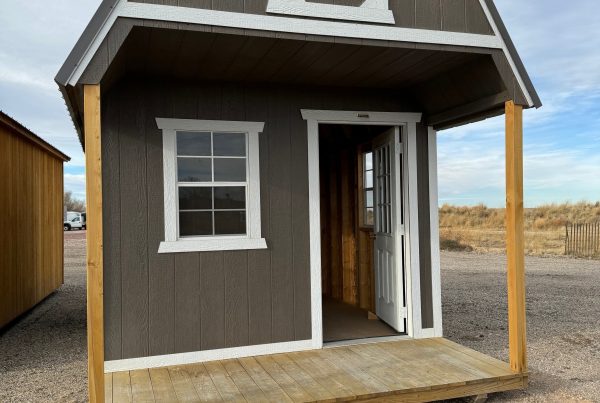 10×20 Front Porch Shed For Sale Dark Ebony Urethane Paint Barn White Trim For Sale at French Creek Designs Shed Sales, Casper, Wyoming