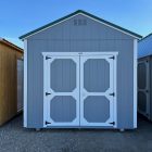 10×12 Utility Shed For Sale Gray Shadow Paint Barn White Trim at French Creek Designs Shed Sales in Casper, WY