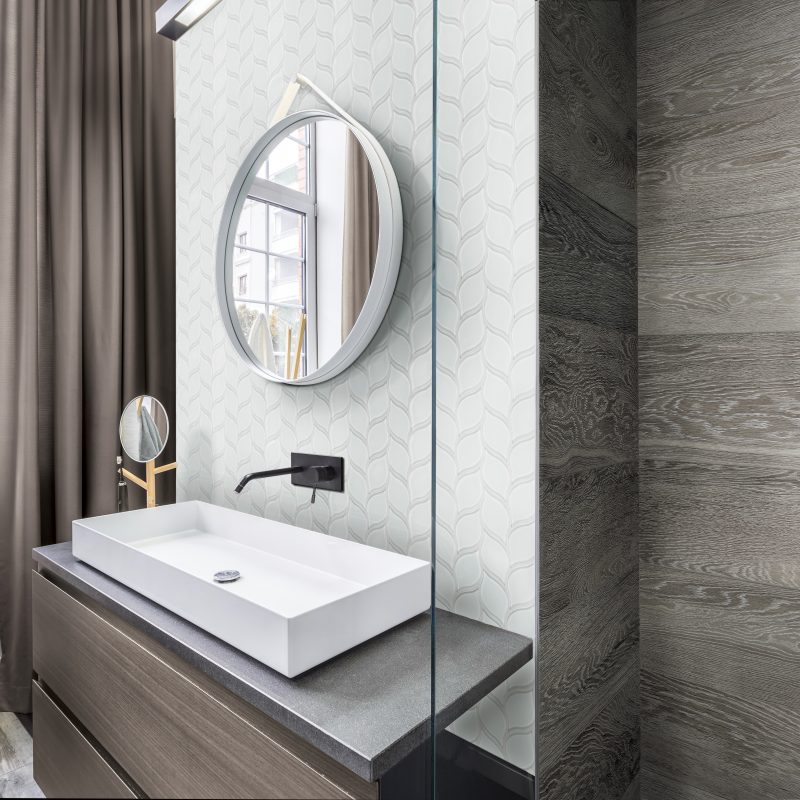 Shop Striking white bathroom tiles, including the pure white petal mosaic at French Creek Designs Tile Design Center in Casper, WY